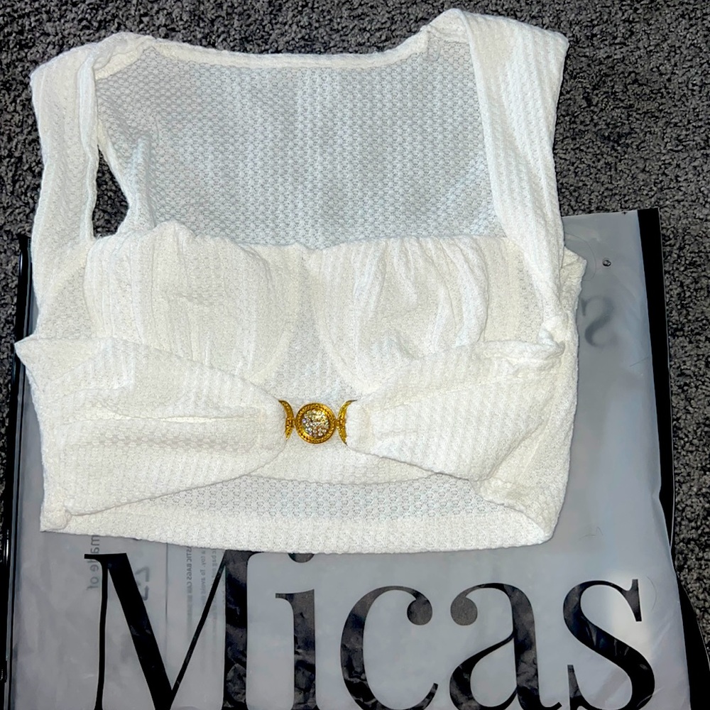 White Micas Going Out Top